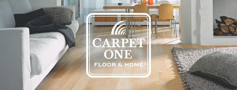 Room scene with luxury vinyl flooring with carpet one logo